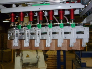 Producten_Palletiseren_Machinale Pakketten_grijper closeup 2